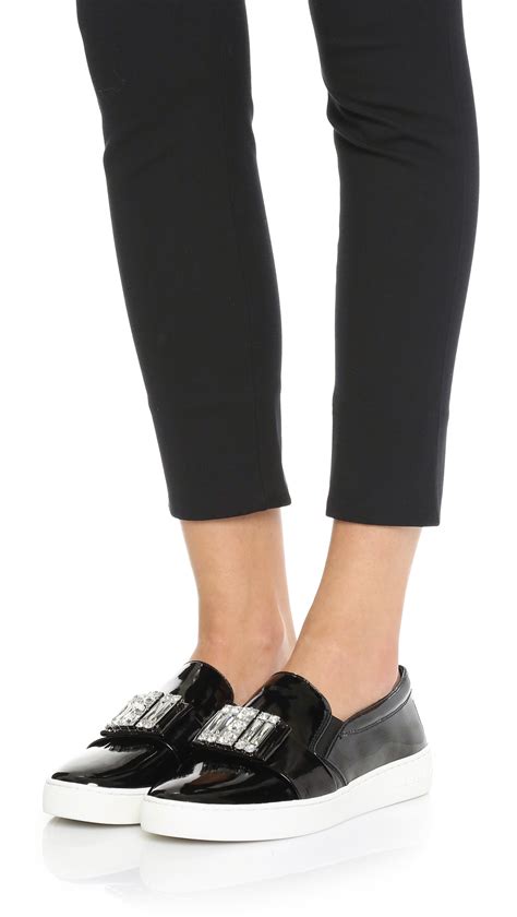 michael kors sneakers zwart sleehak|michael kors black slip on.